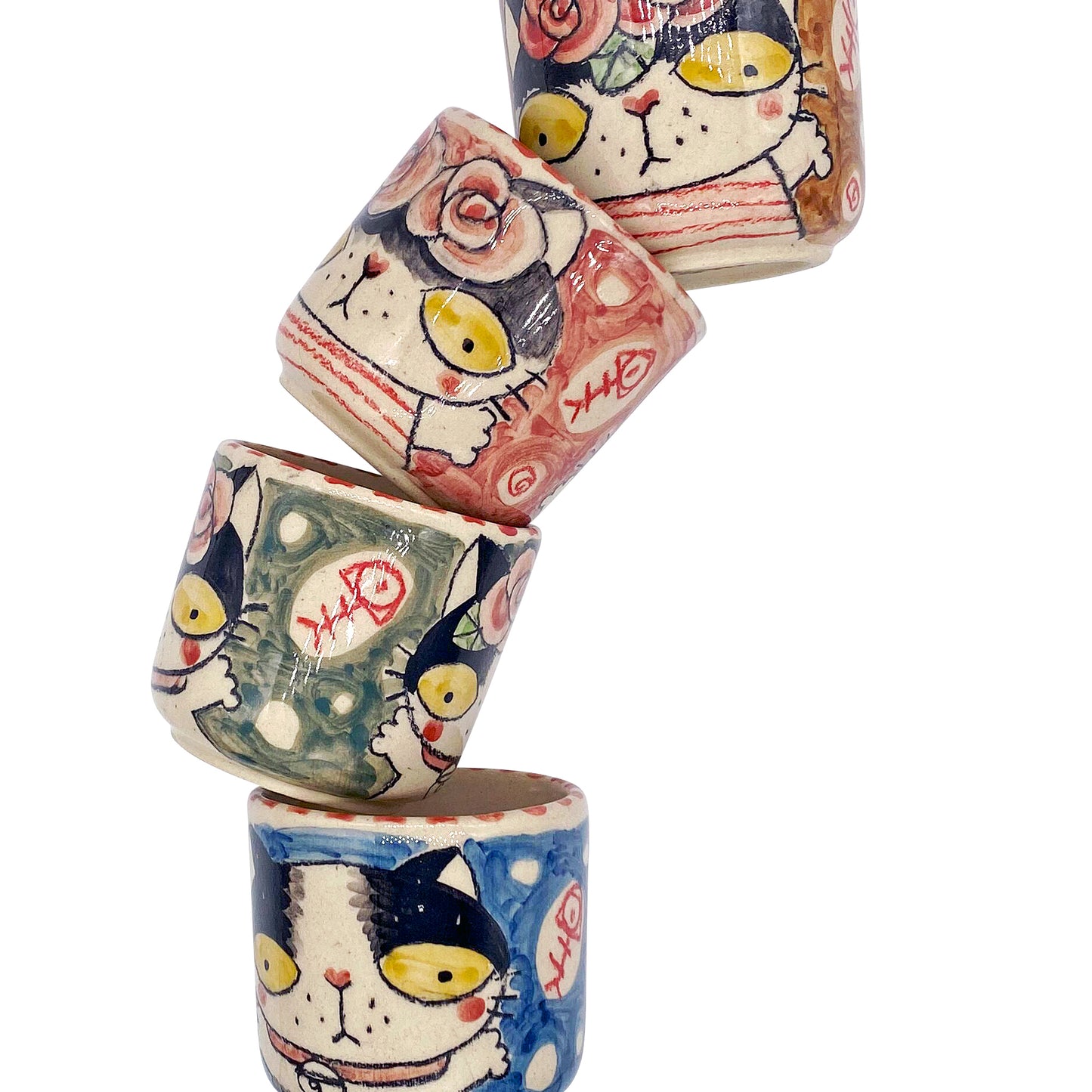 Ceramic tea cups with cat motif