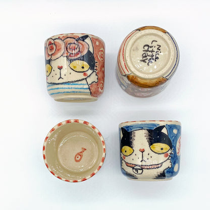 Ceramic sake cups with cat motif